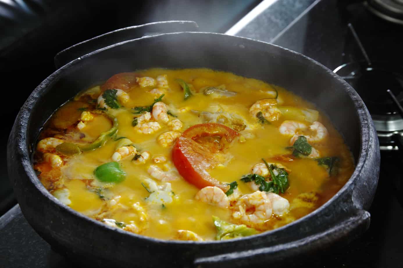 pot of spicy yellow thai curry is a delicious food and champagne pairings.