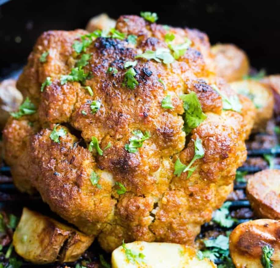 whole roasted cauliflower recipe after its come out of the oven.