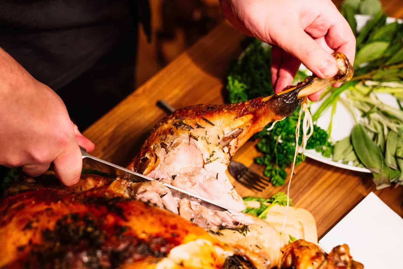 oven roasted turkey being carved