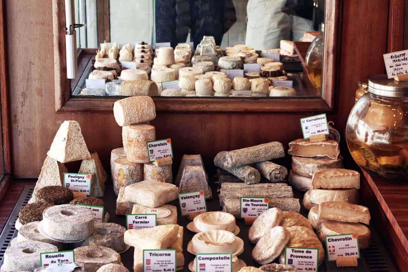 assorted gourmet cheeses used for cheese fondue