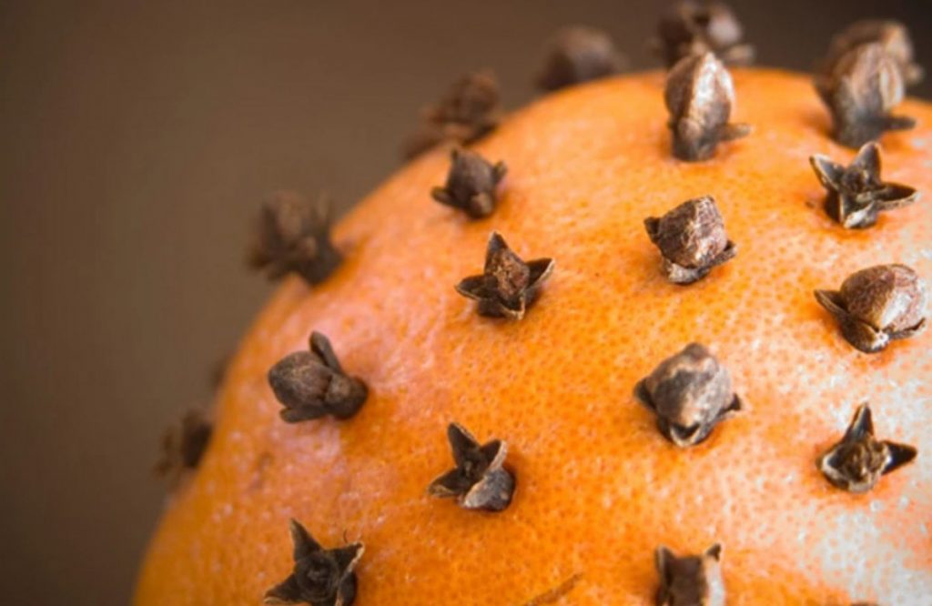 pomanders are an orange studded with cloves used for natural potpurri