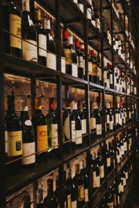 wine bottles on rack for a wine education class