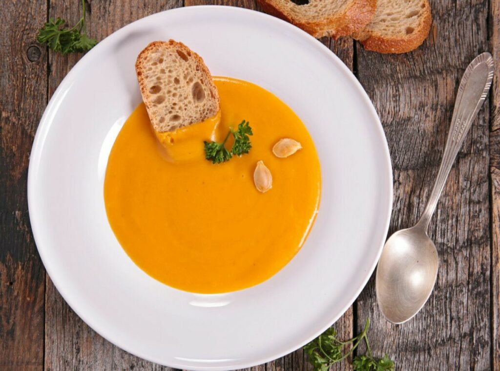 dairy free roasted pumpkin soup recipe completed and served in a bowl